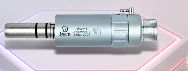 Air motor 202M1 with external spray tube, lying on a white display stand