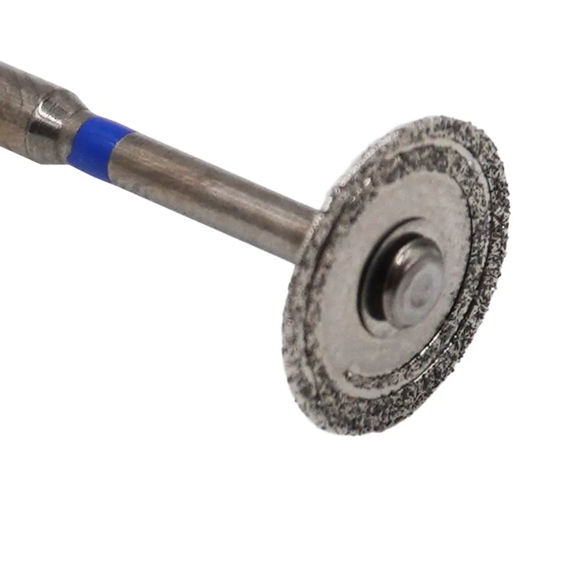 Close-up of the diamond disc rim on its mandrel
