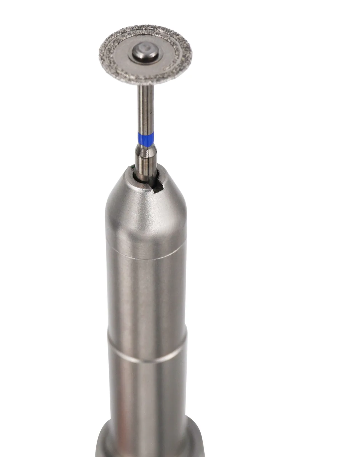 Diamond cutting disc mounted in a straight handpiece