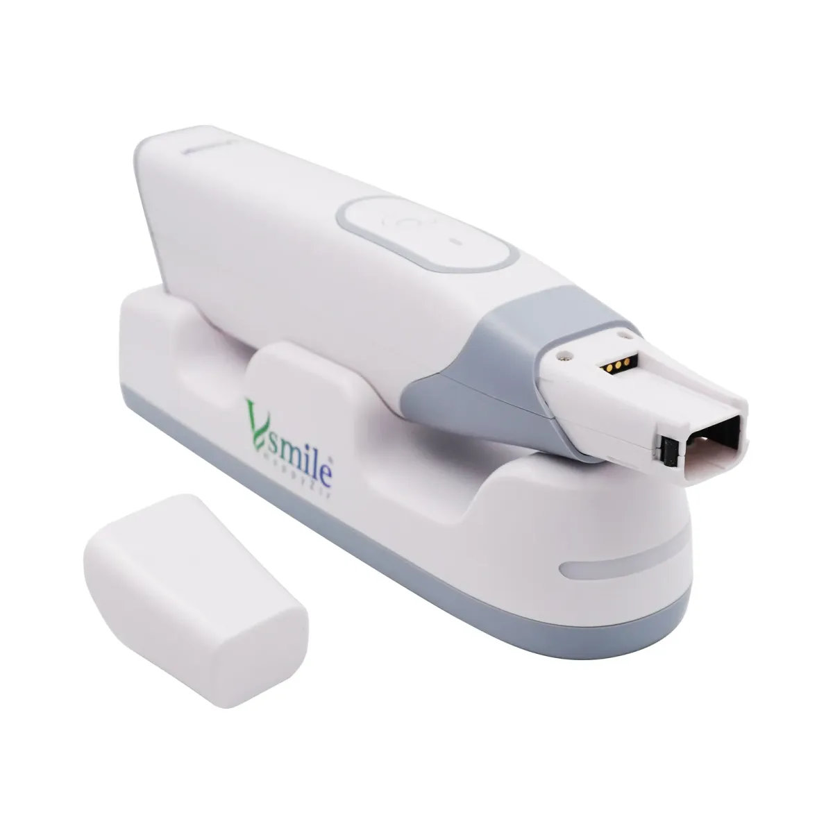 Handheld intraoral scanner in its cradle, with a scan tip beside it