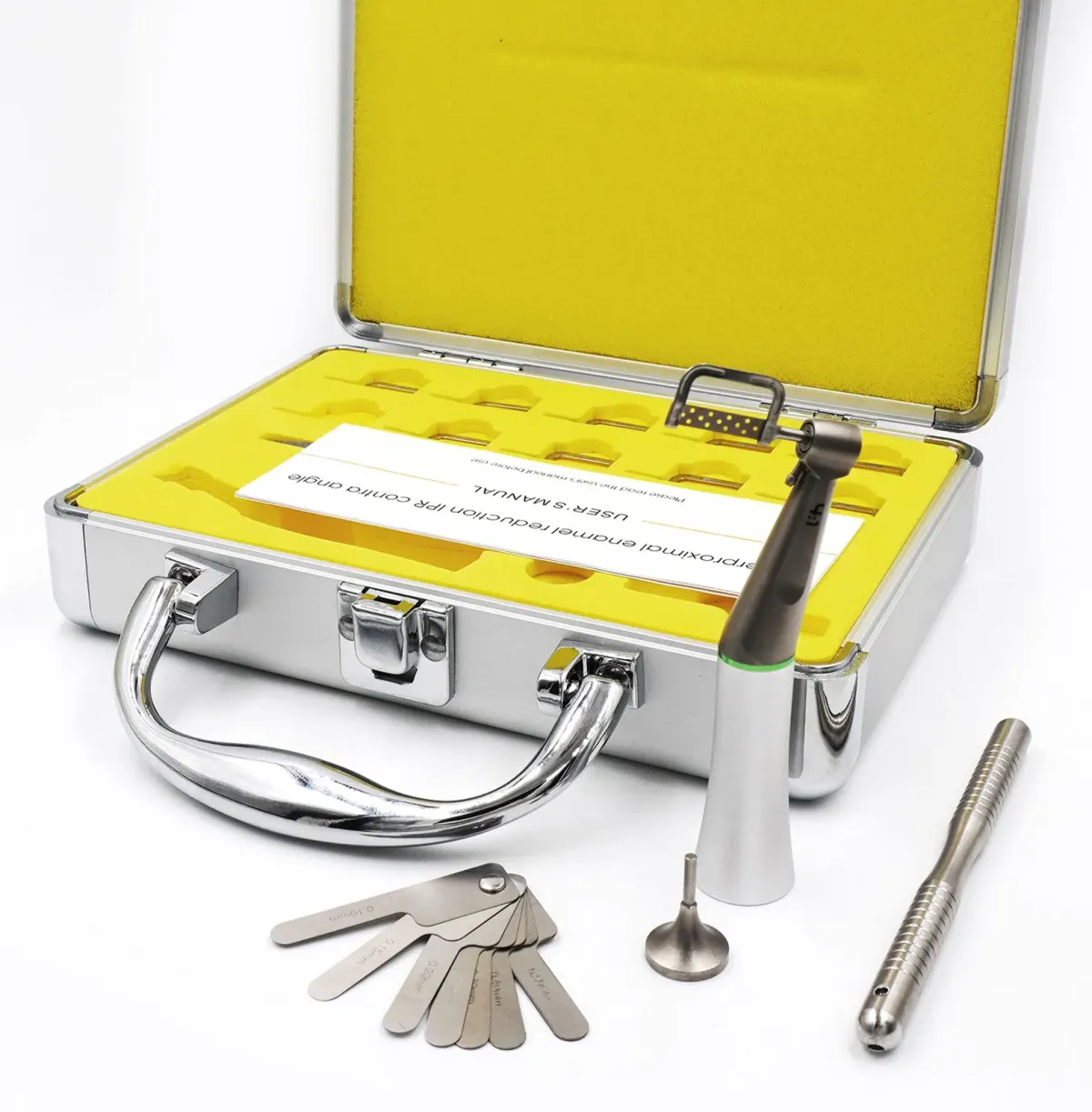 Open aluminium case with yellow foam, IPR contra-angle with strip, hand tool, pushrod and gauge set