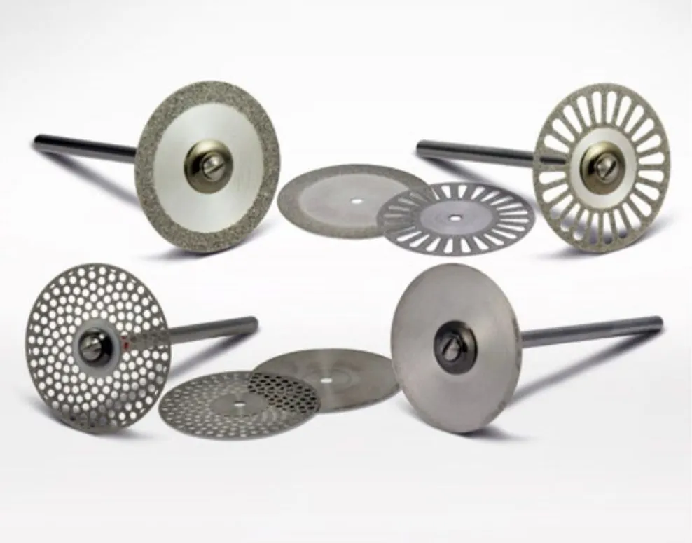 Four diamond discs on mandrels and four loose discs with different rim and hole patterns